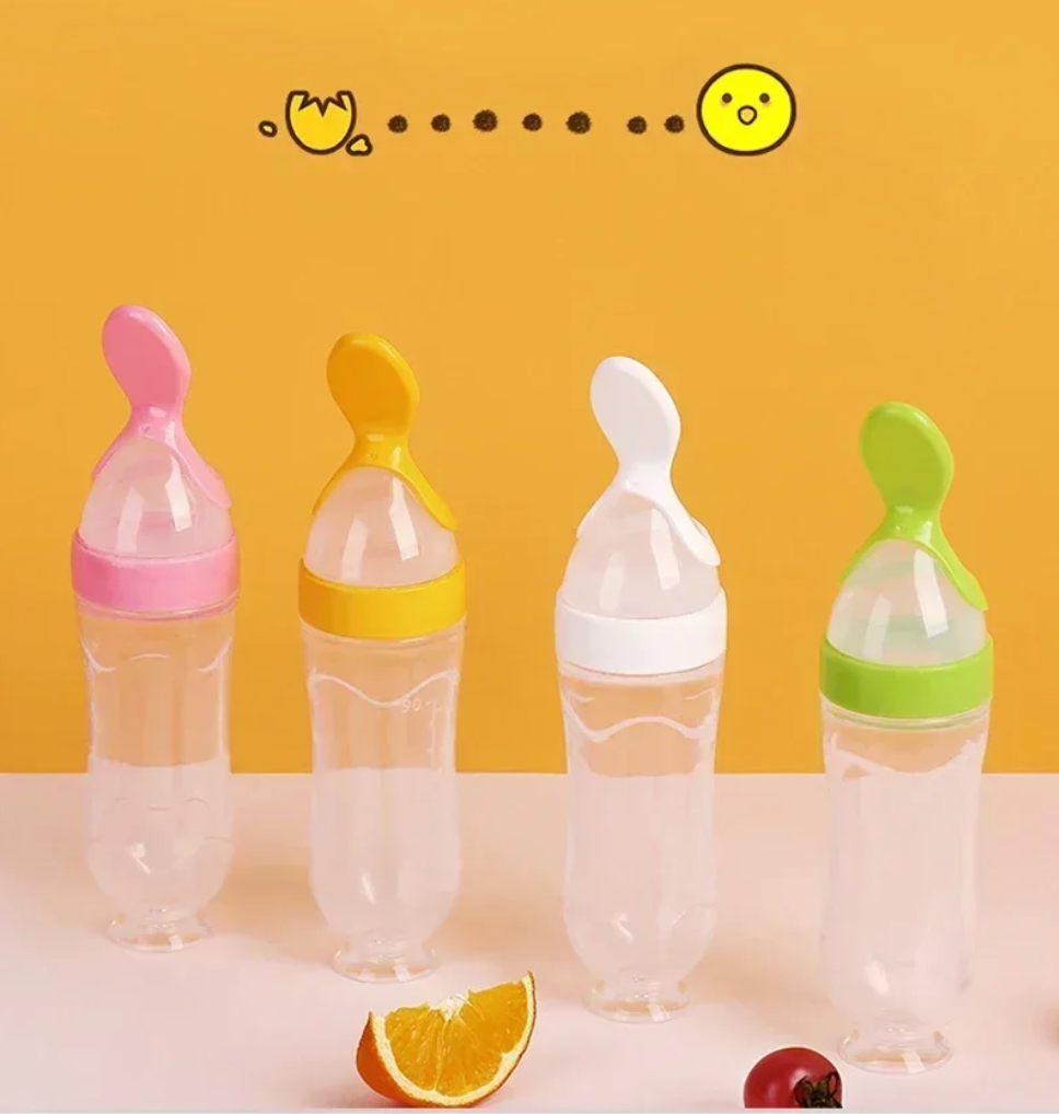 Newborn Baby Squeezing Feeding Bottle